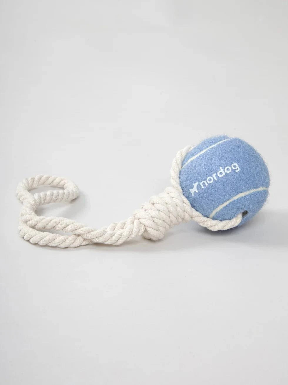 Dragleksak med tennisboll